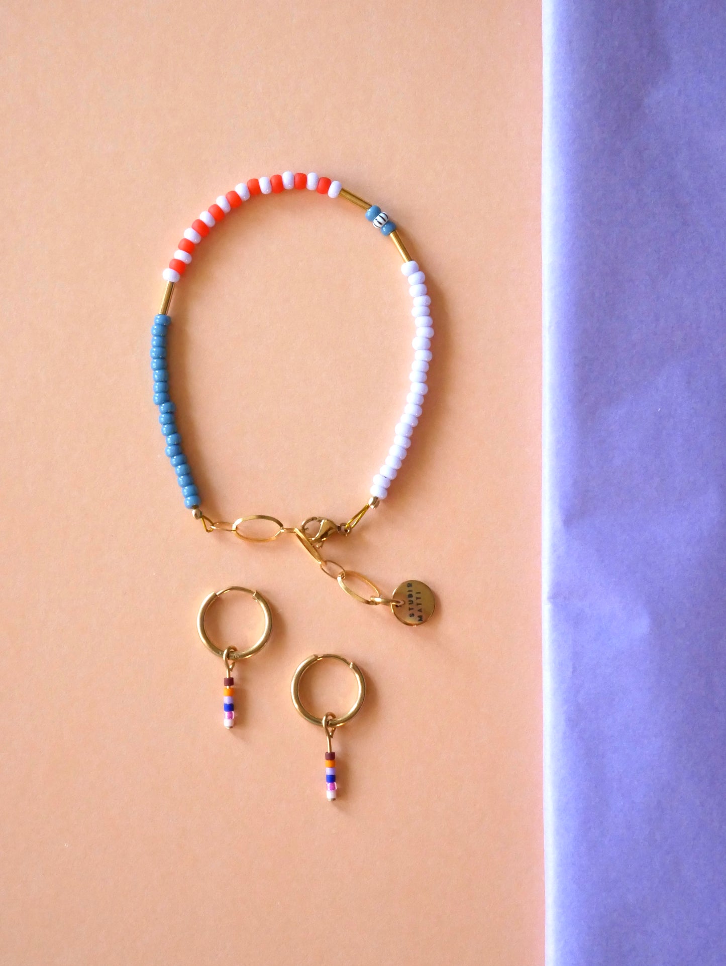 Armband jeansblau-rotorange-flieder #gold