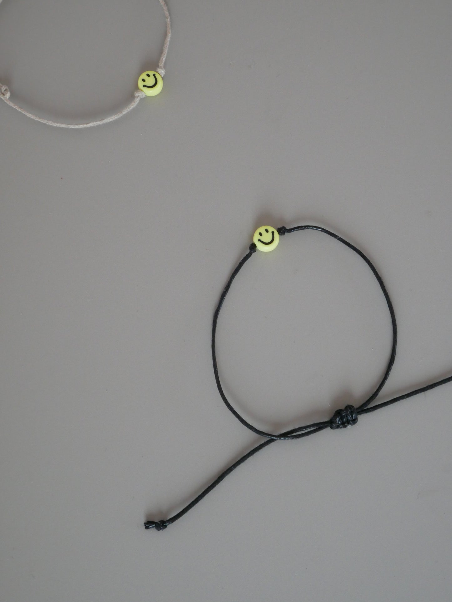 Smiley-Armband schwarz